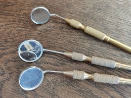 Rhodium coated dental mirrors for indirect vision and retraction